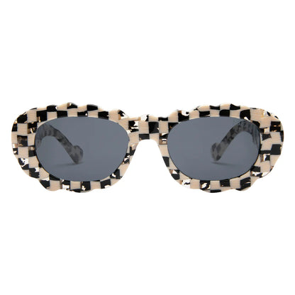 Sunglasses with checkered frame and dark lenses on a white background