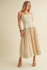 Model wearing Timeless Grace Woven Dress with corset bodice and flowing woven skirt