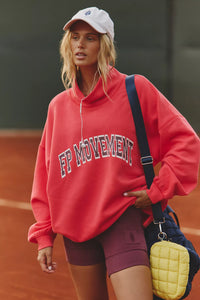 Electric sunset red two piece set with oversized funnel neck pullover and high-rise biker shorts