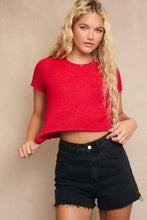 Load image into Gallery viewer, Model wearing City Lights Cropped Sweater in red, short sleeve fitted knit with crew neckline.