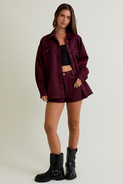Model wearing The Weekend Suede Shorts, high-waisted faux suede shorts styled with matching shacket