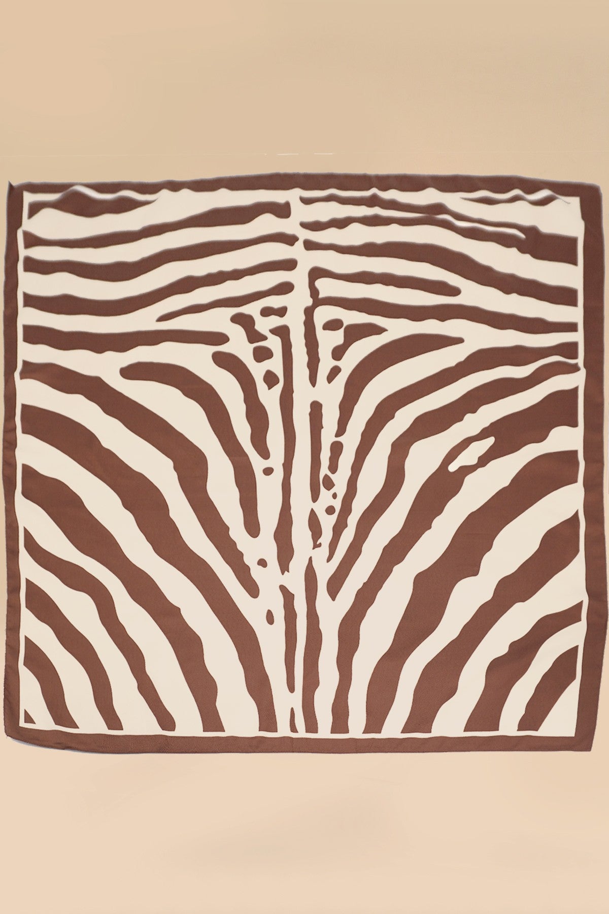 Square scarf with brown and white zebra pattern on a beige background